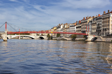 Obraz premium Lyon city with red footbridge in summer