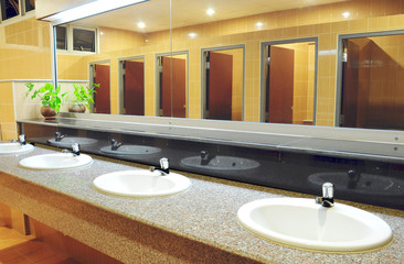 Handbasin and mirror in toilet