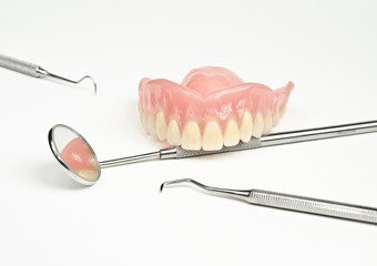 artificial teeth, dental instruments