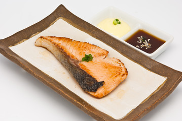 Salmon fish grilled in the plate