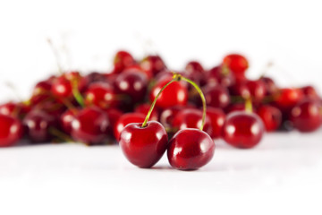 two cherries in front of