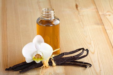 Vanilla pods, flower and bottle