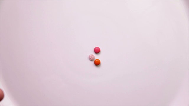 Hand forming spiral with pills