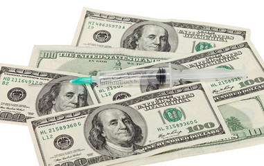 Addiction concept - narcotic, money and syringe against white
