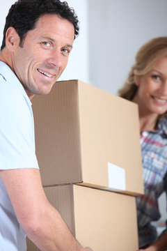 Couple Carrying Boxes