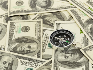 Dollars and compass.