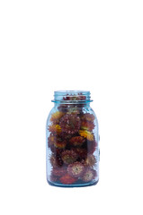 Blue canning jar with bronze flowers