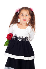 Little girl with red rose