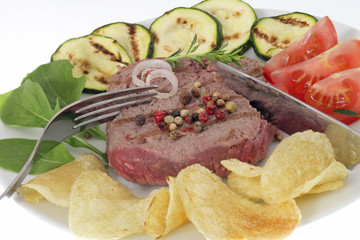 Steak hâché grillé avec garniture
