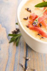 fresh melon soup with parma ham and lavender flower