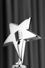 Star award against curtain background