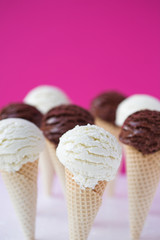 Ice cream cones - organic vanilla & chocolate. Shallow dof