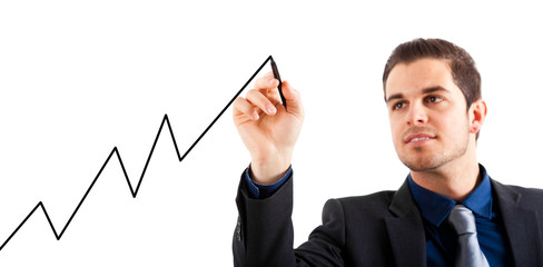 Businessman drawing a rising arrow,  business growth.