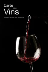 Poster Rode wijn splash op een glas op zwarte achtergrond. © Tommaso Lizzul
