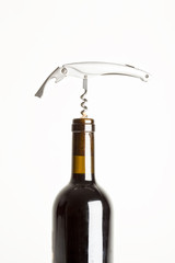 macro close up of corkscrew in wine bottle cork