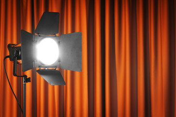 Curtains and projector lights wtih space for your text