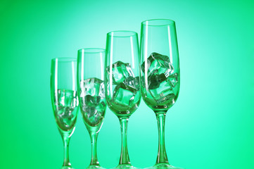 Glasses of water against gradient background