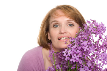 Smiling woman with wildflowers