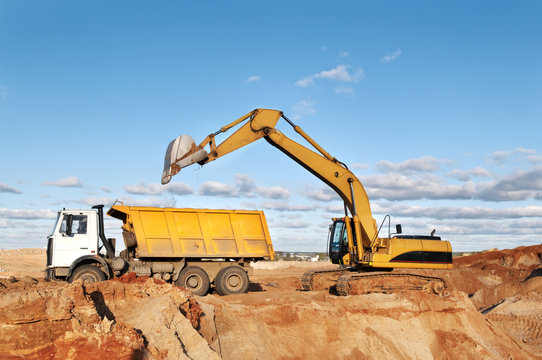 track-type loader excavator and tipper dumper
