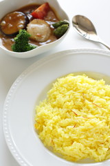 Seafood curry with saffron rice