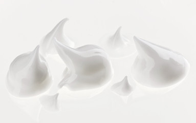 Light face cream drops  samples on white