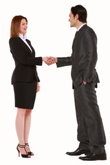 businessman and businesswoman shaking hands