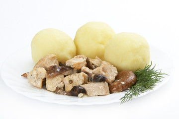 Roast turkey with mushrooms and potato balls