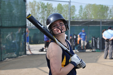 Fototapeta na wymiar Smiling Softball Girl