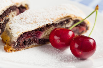 Poppy seed strudel with cherry.