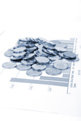 Coins and chart