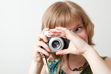 Woman with a vintage camera