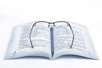 Book,glasses and pencil