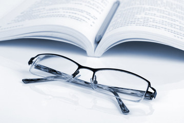 Book,glasses and pencil