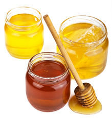 honey in jars isolated