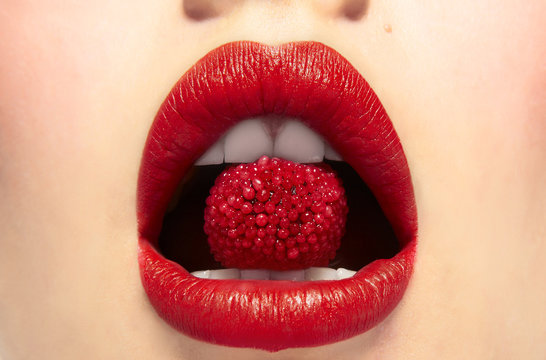 Lips Bitting A Berry