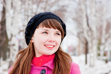 woman is in winter in a park
