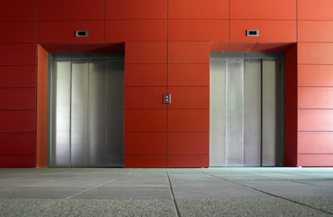 Two elevator doors in a luxurious building © Deyan Georgiev