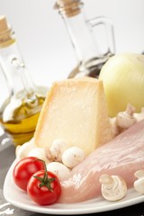 Fresh raw chicken fillets with vegetables