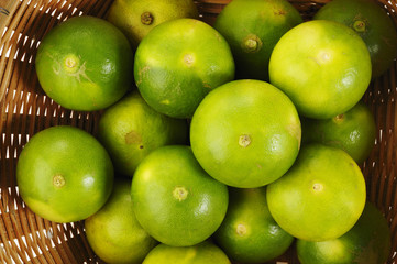 green lime in basket