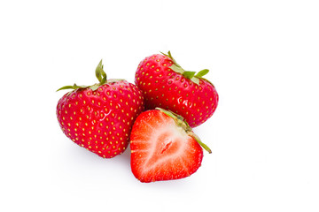 Fresh ripe red strawberries on white background.