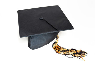 Black graduation cap with tassel.