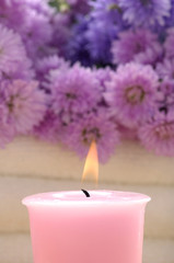 Obraz na płótnie Canvas Spa set – pink flowers and aroma candles,