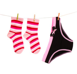 Woman's panties  hanging on white background