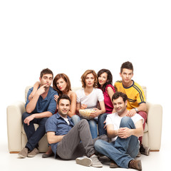 Fototapeta premium young casual friends watching television