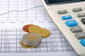 Financial Graph with Coins And Calculator