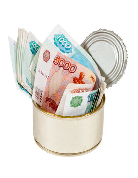 Russian roubles  bills  in  tin can over white background