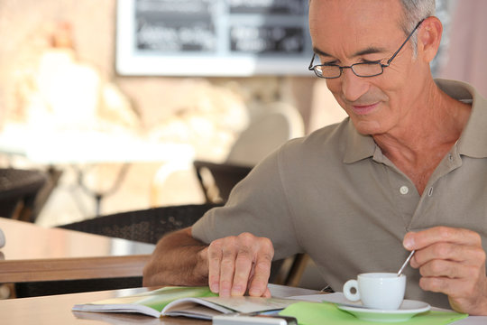 senior having cup of coffee