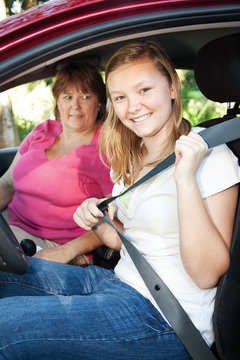 Teenage Driver Fastens Seatbelt