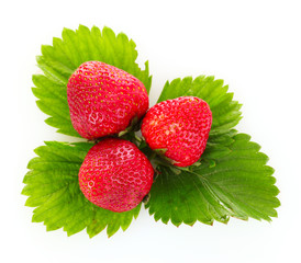 strawberry with green leaves isolated on white
