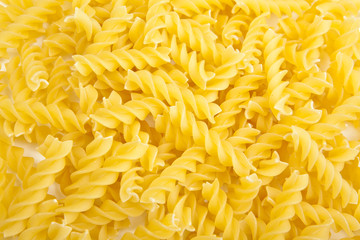 fusilli italian pasta, food background